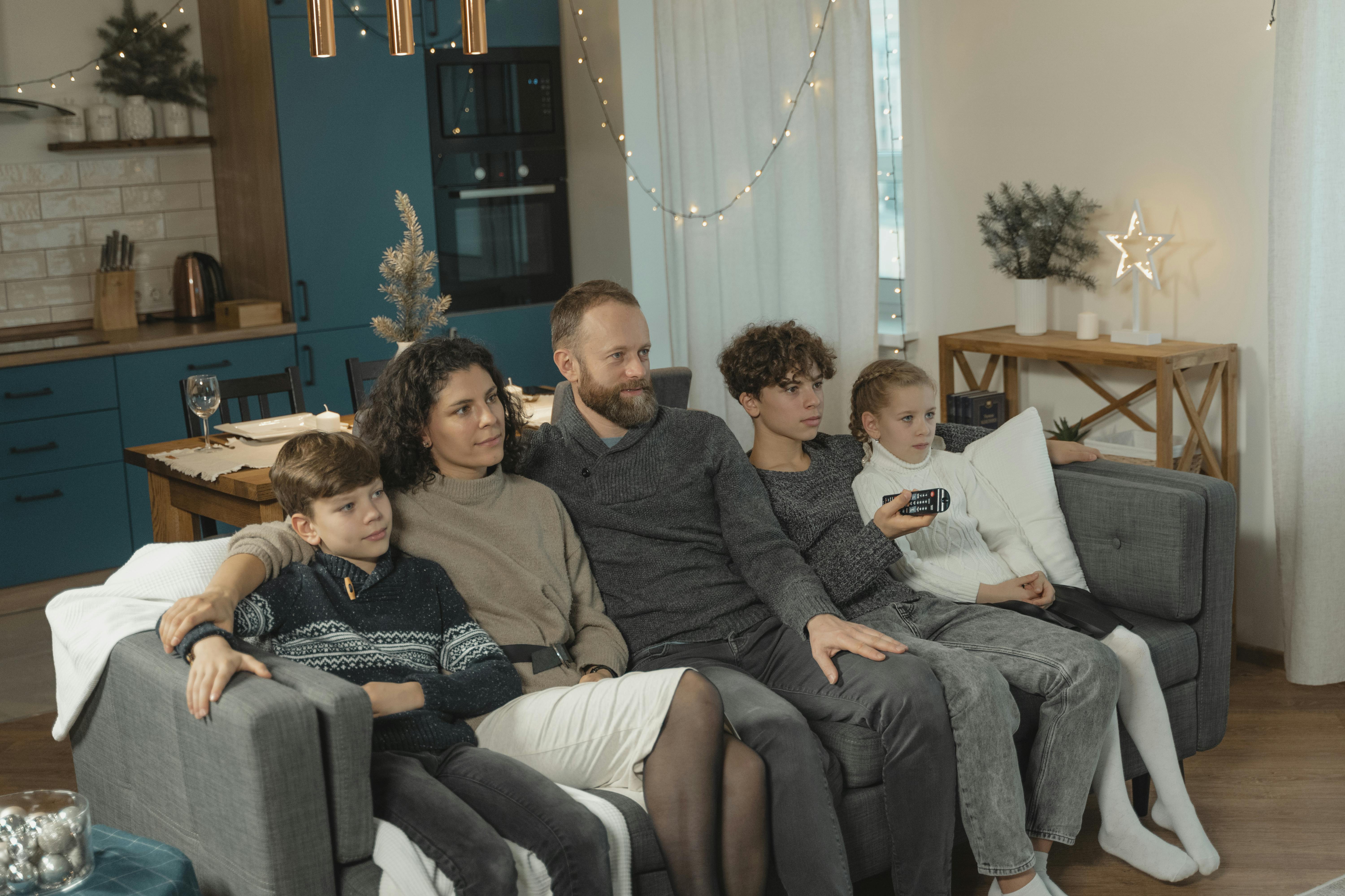 Family relaxing at home with strong Wi-Fi